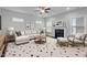 Bright living room features stylish furnishings, a modern fireplace, and comfortable seating at 2057 Big Falls Dr, Wendell, NC 27591