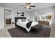 Nicely appointed main bedroom with a ceiling fan, a large bed, and decor at 2057 Big Falls Dr, Wendell, NC 27591