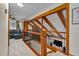 Spacious living room with wood beam details, fireplace, and cozy seating area at 206 Cottrell Dr, Louisburg, NC 27549