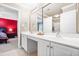 Bright bathroom features a double sink vanity with white cabinets and an oversized mirror at 206 Glebe Way, Cary, NC 27519