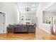 Bright living room with vaulted ceilings, skylights, fireplace, and hardwood floors at 206 Glebe Way, Cary, NC 27519