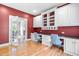 Charming office with built-ins and french doors that open into a bright, inviting living space at 206 Glebe Way, Cary, NC 27519