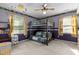 bedroom featuring a bunk bed, neutral carpet, and plenty of natural light at 2113 Port Royal Rd, Raleigh, NC 27609