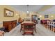 Bright dining room features a large table, elegant chandelier, and seamless access to the living room at 2113 Port Royal Rd, Raleigh, NC 27609