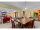 Spacious dining room features a large wooden table and natural light at 2113 Port Royal Rd, Raleigh, NC 27609