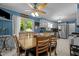 Well-lit kitchen and dining area with stainless steel appliances and access to outdoor pool at 2113 Port Royal Rd, Raleigh, NC 27609