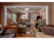 Inviting living room with comfortable seating, ceiling fan, and hardwood floors at 2113 Port Royal Rd, Raleigh, NC 27609