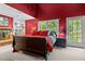 Warm main bedroom features a cozy fireplace, built-in shelves, and private exit at 2113 Port Royal Rd, Raleigh, NC 27609