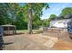 Large backyard featuring well maintained yard and a patio area with an outdoor gazebo at 2210 Milburnie Rd, Raleigh, NC 27610