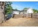 Exterior of home featuring a deck, backyard, shed, and fenced in yard at 2210 Milburnie Rd, Raleigh, NC 27610