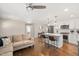 Bright and airy living space with a modern open floor plan, integrating kitchen and sitting area at 2210 Milburnie Rd, Raleigh, NC 27610
