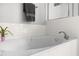 Bathroom with a luxurious soaking tub and a tiled surround at 2301 Bolingbrook Ln, Raleigh, NC 27613