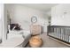Comfortable Bedroom space featuring a crib and an upholstered chair at 2301 Bolingbrook Ln, Raleigh, NC 27613