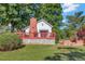 Exterior view of back deck with privacy and large brick chimney at 251 Charles Riddle Rd, Sanford, NC 27330