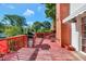 Outdoor deck with a gas grill, patio umbrella and chairs with lush green views at 251 Charles Riddle Rd, Sanford, NC 27330