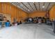 Spacious garage interior with wood framing, ample lighting and storage space for multiple vehicles at 2690 Meadow View Ln, Sanford, NC 27332