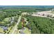 An aerial view of the home nestled amidst lush greenery, highlighting its peaceful and secluded setting at 2717 Jack Rd, Clayton, NC 27520