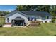 Charming home with a well-maintained backyard featuring a gazebo and deck perfect for outdoor gatherings at 2717 Jack Rd, Clayton, NC 27520
