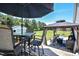 Inviting backyard with outdoor seating, gazebo, and manicured lawn perfect for entertaining and relaxation at 2717 Jack Rd, Clayton, NC 27520