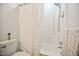 Functional bathroom featuring a toilet, tub and shower with decorative curtain, and fixtures for everyday convenience and style at 2717 Jack Rd, Clayton, NC 27520