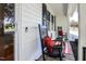 Close-up of a cozy front porch with rocking chairs, decorative pillows, and a welcoming ambiance at 2717 Jack Rd, Clayton, NC 27520