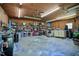 Large garage/workshop with a variety of tools, equipment, and ample storage solutions throughout the space at 2717 Jack Rd, Clayton, NC 27520