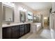 Bathroom featuring double vanity sinks, a garden tub, and walk in shower at 281 N Serenity Hill Cir, Chapel Hill, NC 27516