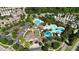 Aerial view of a luxurious community pool and neighborhood highlighting its central location and appeal at 281 N Serenity Hill Cir, Chapel Hill, NC 27516
