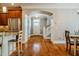 Open entryway featuring hardwood floors and views into the kitchen at 281 N Serenity Hill Cir, Chapel Hill, NC 27516
