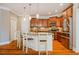 Gourmet kitchen with a large island, stainless steel appliances, and ample cabinet space at 281 N Serenity Hill Cir, Chapel Hill, NC 27516