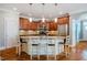 Gourmet kitchen with a large island, stainless steel appliances, and ample cabinet space at 281 N Serenity Hill Cir, Chapel Hill, NC 27516