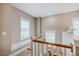 Bright landing with windows and wood and white banister at 281 N Serenity Hill Cir, Chapel Hill, NC 27516