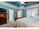 Bright main bedroom with blue accent ceilings and access to ensuite bathroom at 281 N Serenity Hill Cir, Chapel Hill, NC 27516