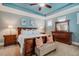 Relaxing main bedroom with blue tray ceilings and carpet flooring at 281 N Serenity Hill Cir, Chapel Hill, NC 27516