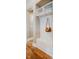 Mudroom with built-in bench, storage shelves, and coat hooks at 281 N Serenity Hill Cir, Chapel Hill, NC 27516