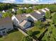 Aerial view of the neighborhood showcasing mature trees and lush green lawns at 2812 Prospect Pkwy, Durham, NC 27703