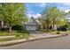 Charming two-story home featuring stone accents, an attached garage, and a well-manicured lawn at 2812 Prospect Pkwy, Durham, NC 27703
