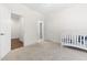 Bedroom with view to bathroom and hallway at 30 Ocoee Falls Dr, Chapel Hill, NC 27517