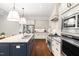 Spacious kitchen with a large island, stainless steel appliances, and modern design at 30 Ocoee Falls Dr, Chapel Hill, NC 27517
