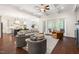 Bright living room featuring a coffered ceiling, hardwood floors, and access to the outdoors at 30 Ocoee Falls Dr, Chapel Hill, NC 27517