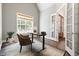 Office with hardwood floors, neutral paint, natural light, and french doors at 30 Ocoee Falls Dr, Chapel Hill, NC 27517