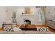 Comfortable living room with a fireplace, hardwood floors, and plenty of natural light at 300 Livingstone Dr, Cary, NC 27513
