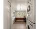 Laundry room includes an office space with windows for lots of natural light at 305 E Holmes St, Benson, NC 27504
