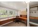 Office with a built-in desk and lots of natural light at 305 E Holmes St, Benson, NC 27504