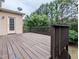 Large wood deck is accessible from the home's second story at 306 Mainline Station Dr, Morrisville, NC 27560