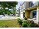 Charming home exterior with well-manicured lawn, showing the front door and attached garage at 306 Mainline Station Dr, Morrisville, NC 27560