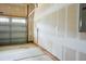 Spacious garage with an insulated door and plenty of wall space for storage and customization at 306 Mainline Station Dr, Morrisville, NC 27560
