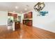 Open kitchen features stainless steel appliances, granite countertops, and a large island at 306 Mainline Station Dr, Morrisville, NC 27560