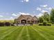 Expansive lawn and backyard featuring a luxurious in-ground pool at 3403 Raccoon Run Dr, Burlington, NC 27215