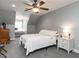Comfortable bedroom with a ceiling fan and natural light at 3403 Raccoon Run Dr, Burlington, NC 27215
